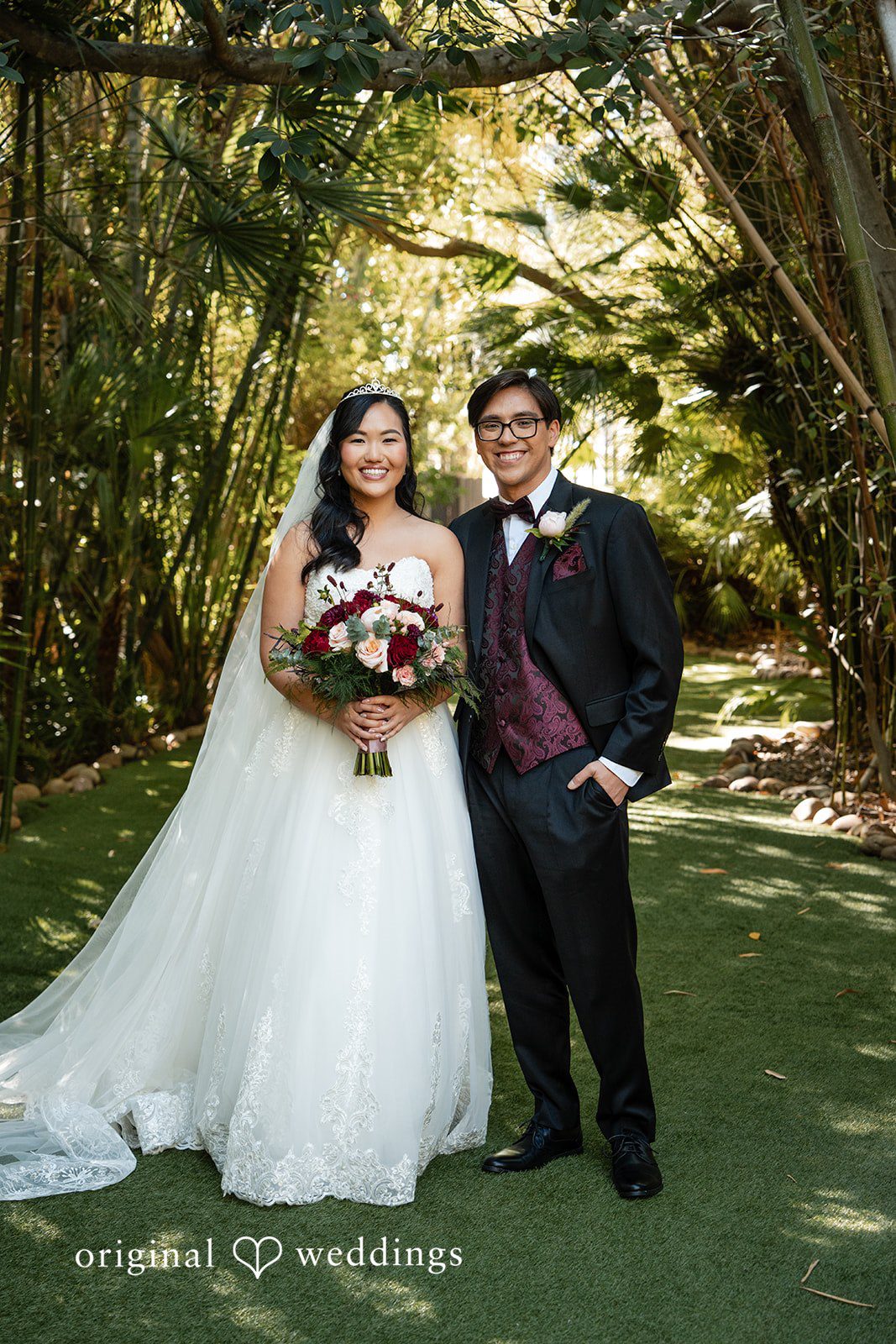 A portrait of the couple by the forest