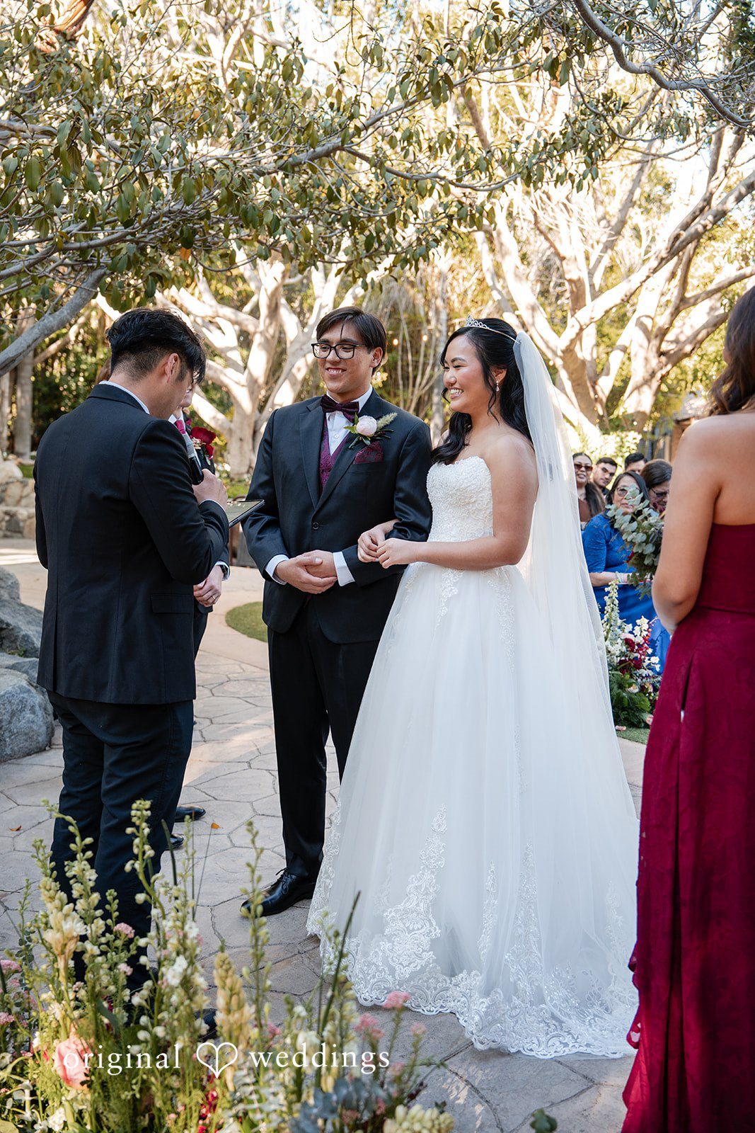 The groom reads his vows to the bride