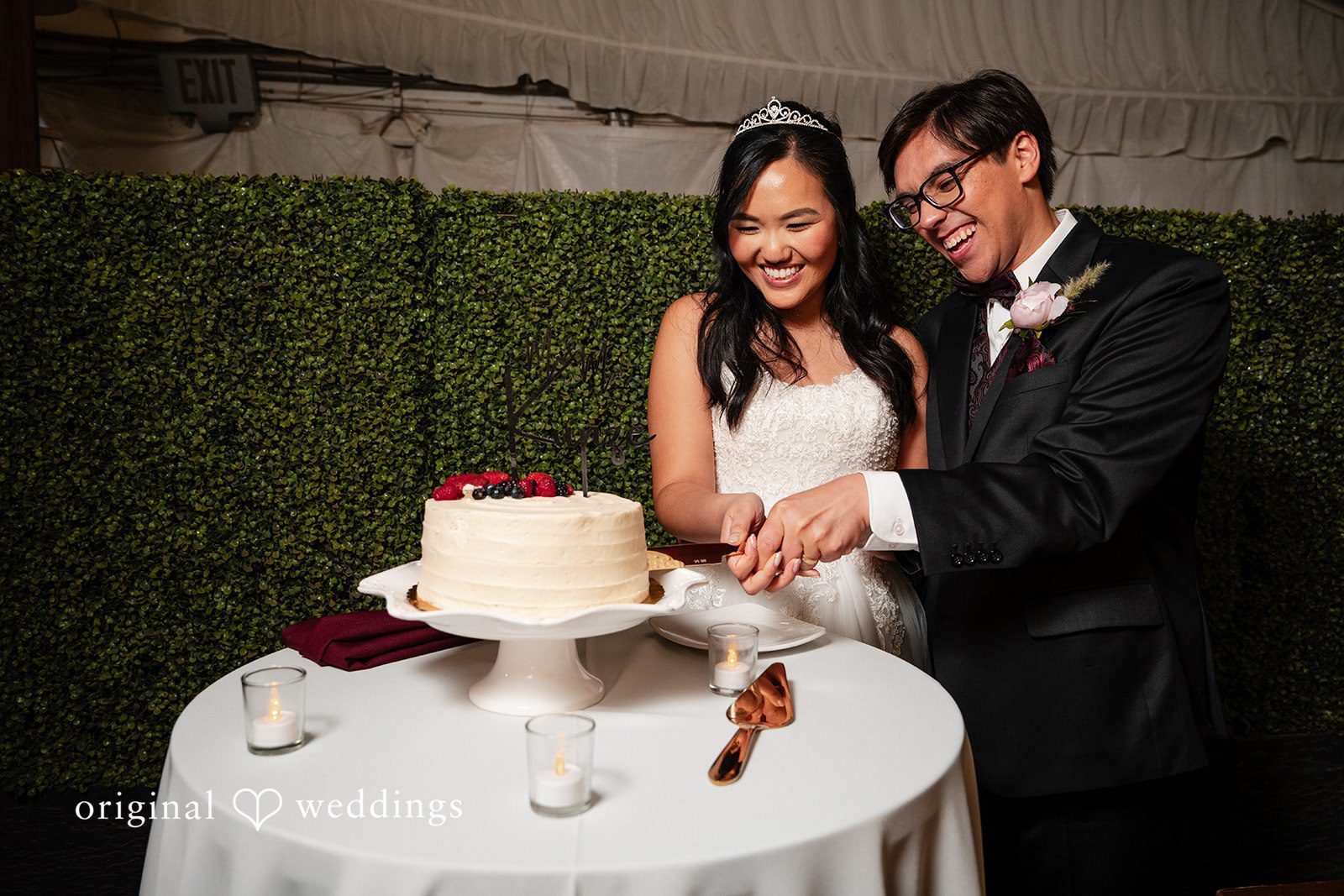 The couple cuts the cake