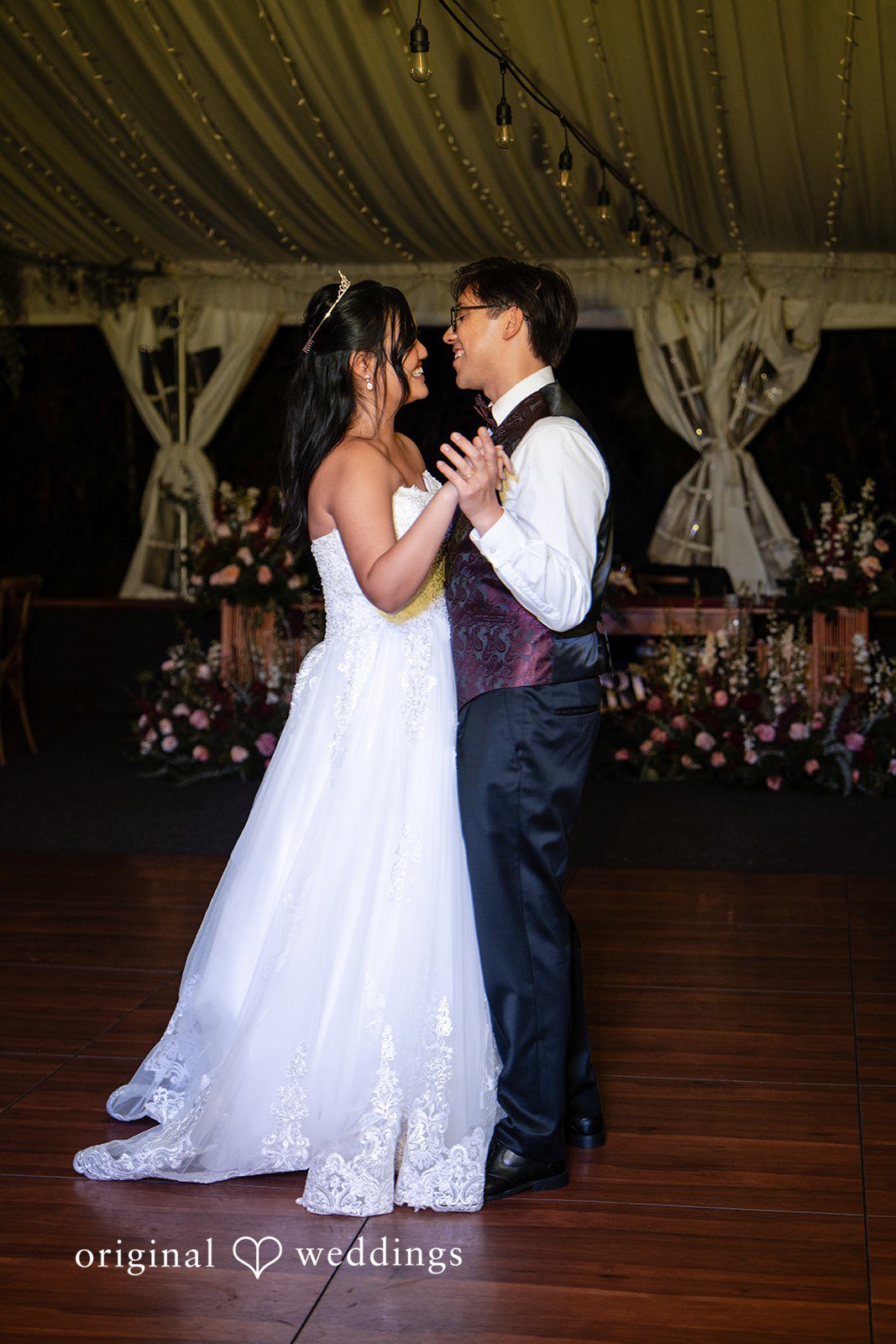 The couple dances in the wedding reception