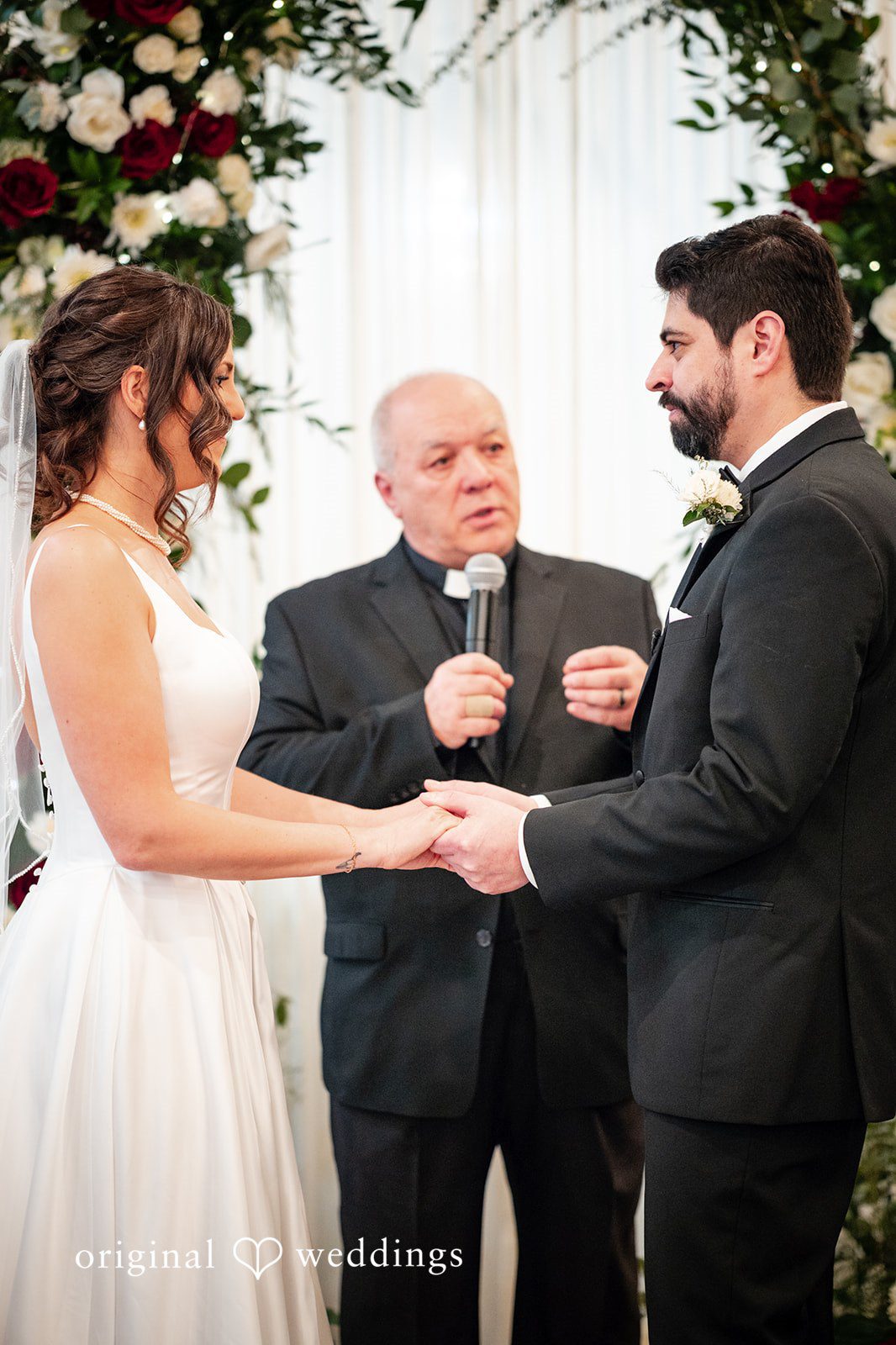 Elizabeth + Aldo Bride and groom exchanging vows during the ceremony