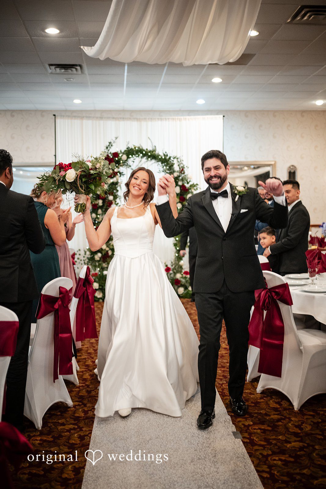 Elizabeth + Aldo Bride and groom celebrating after the ceremony together