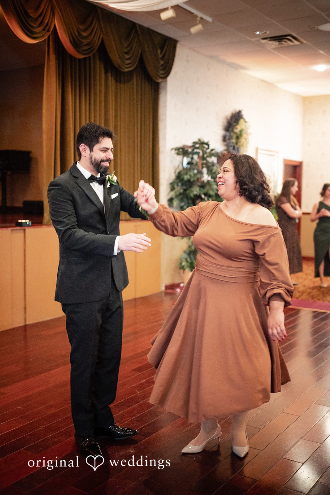 Elizabeth + Aldo Parent dance during the wedding celebration