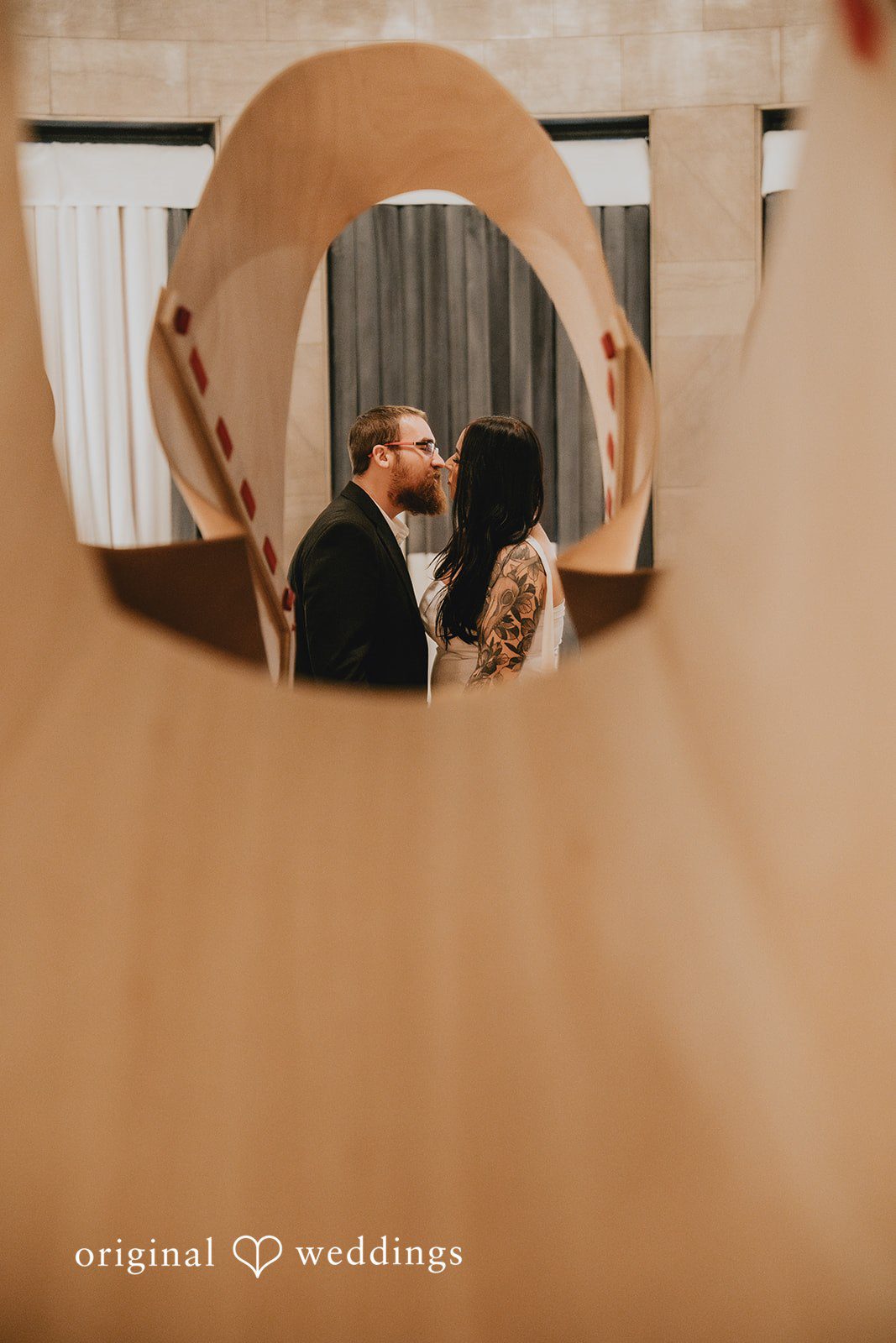 A stylish portrait of the couple at Chicago Cultural Center