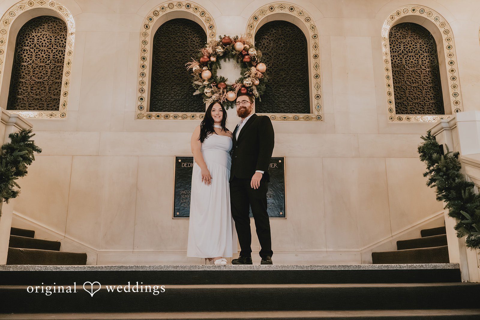 Our Chicago wedding photographers captured a gorgeous portrait of the couple at Chicago Cultural Center