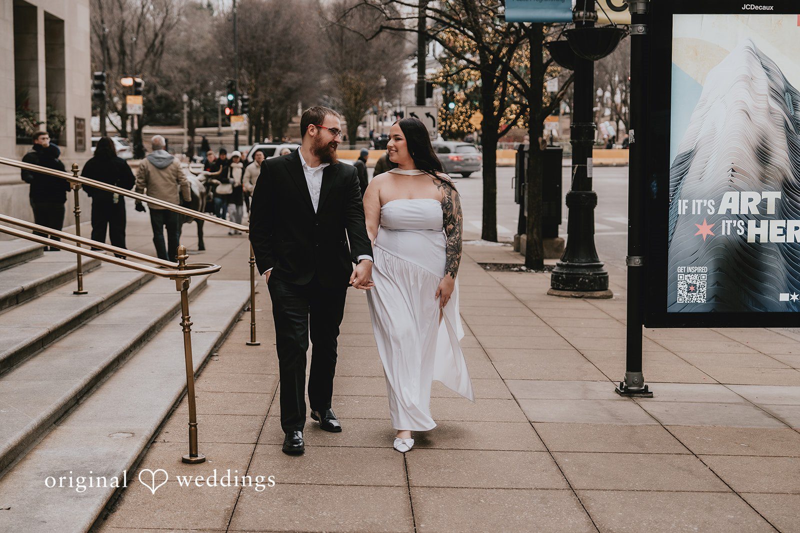 The couple takes a walk through the venue's outdoor space