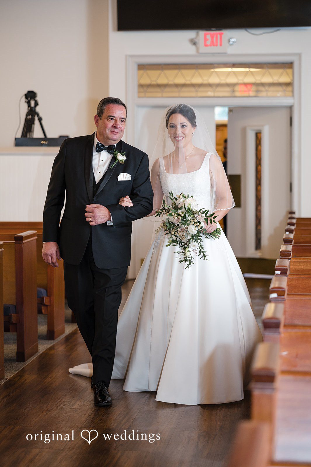 Bride walking down the aisle at Christ Covenant Sandy Springs wedding ceremony