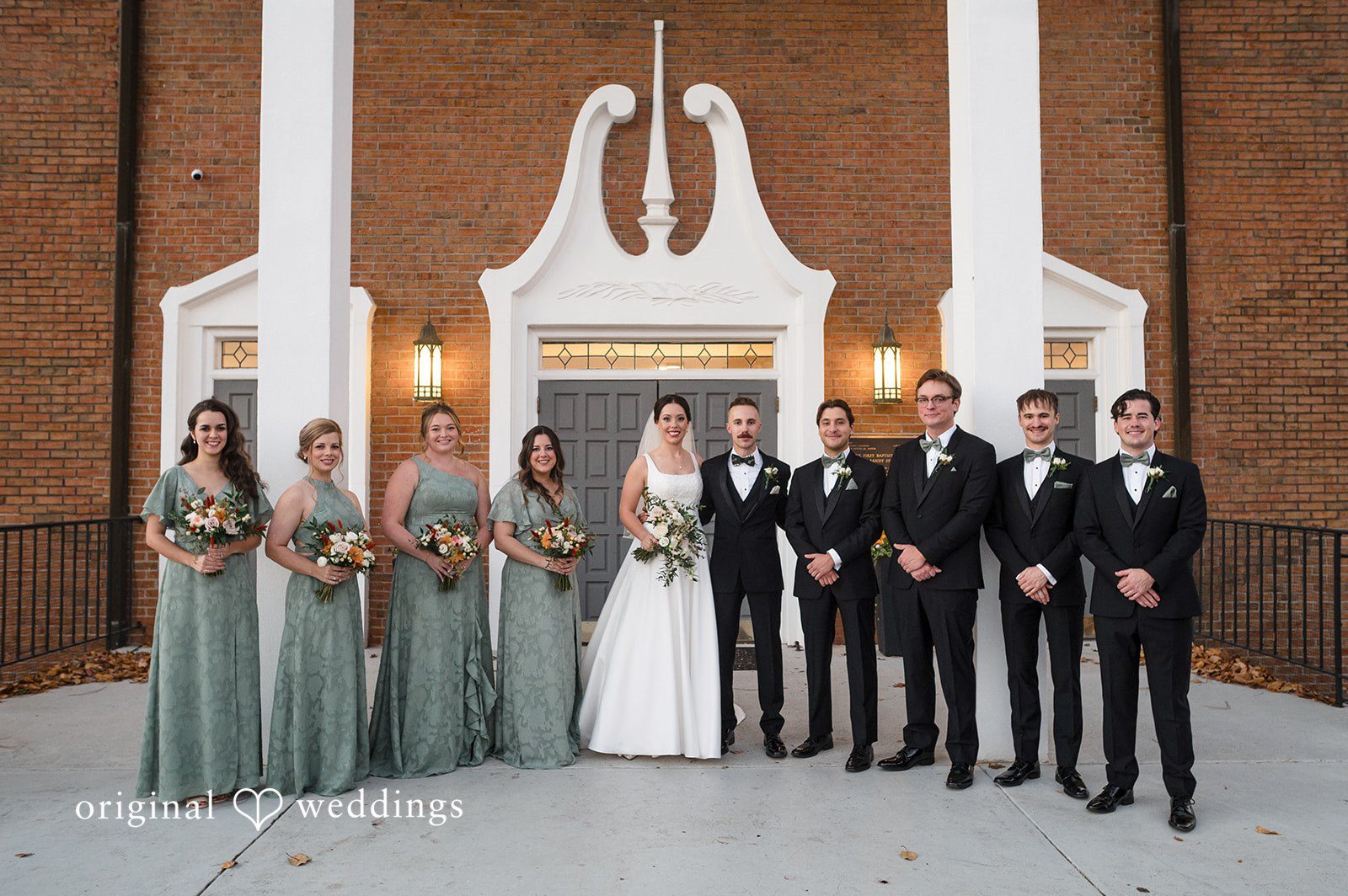 Beautiful wedding party group photo captured outside Christ Covenant Sandy Springs