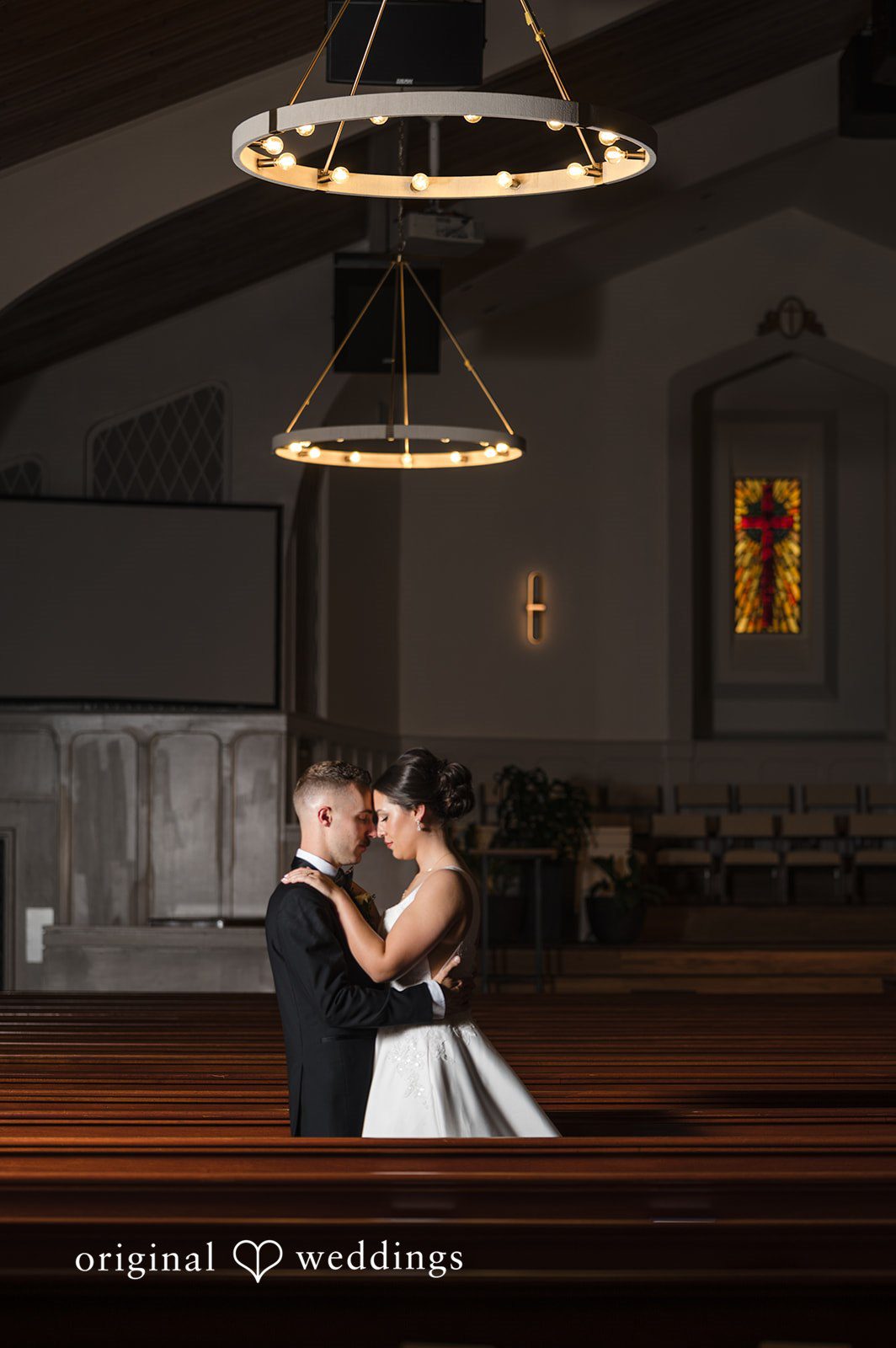 Romantic couple portrait inside Christ Covenant Sandy Springs photographed by Atlanta wedding photographers from Original Weddings