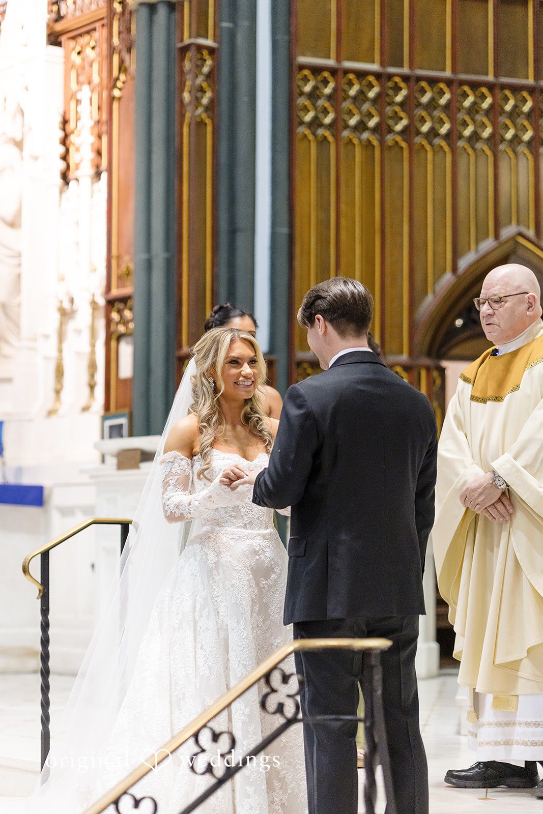 The couple exchanges rings