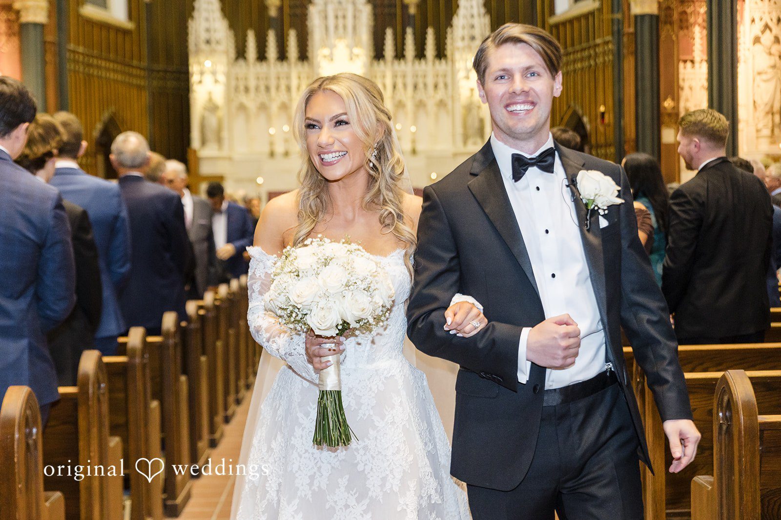 Our Philadelphia wedding photographers at Original Weddings captured the beautiful moment the couple made a joyful exit after their wedding ceremony to have their Crystal Tea Room wedding reception