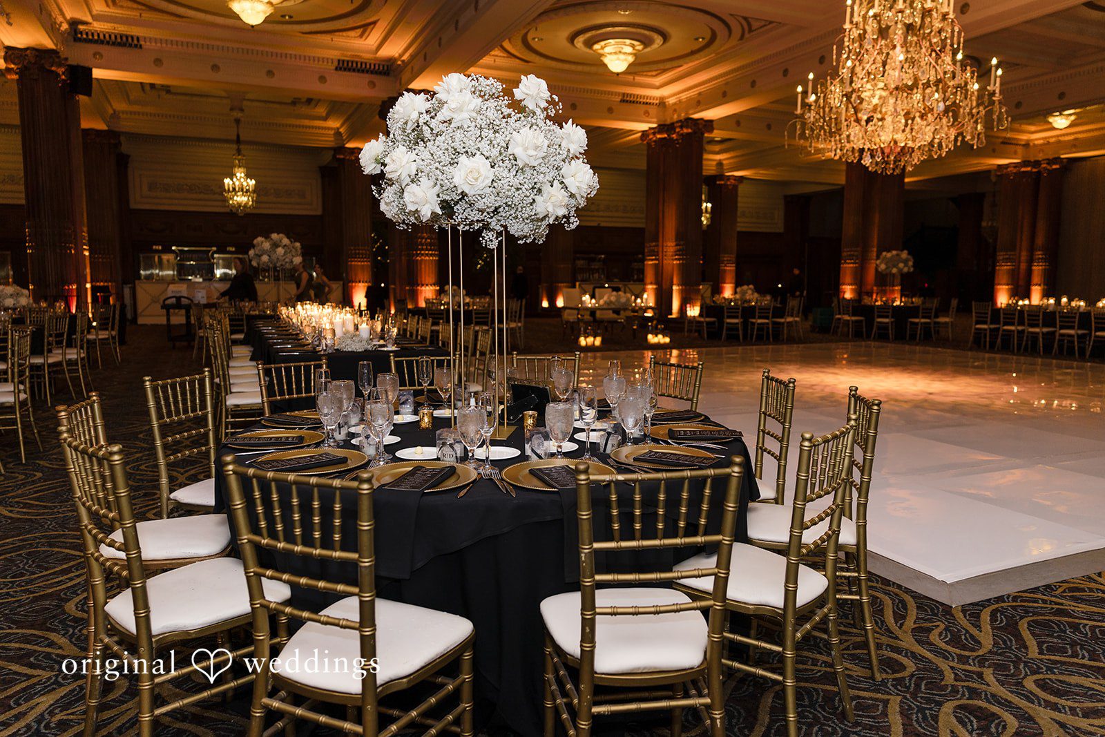 Beautifully decorated tables and chairs at the Crystal Tea Room wedding reception