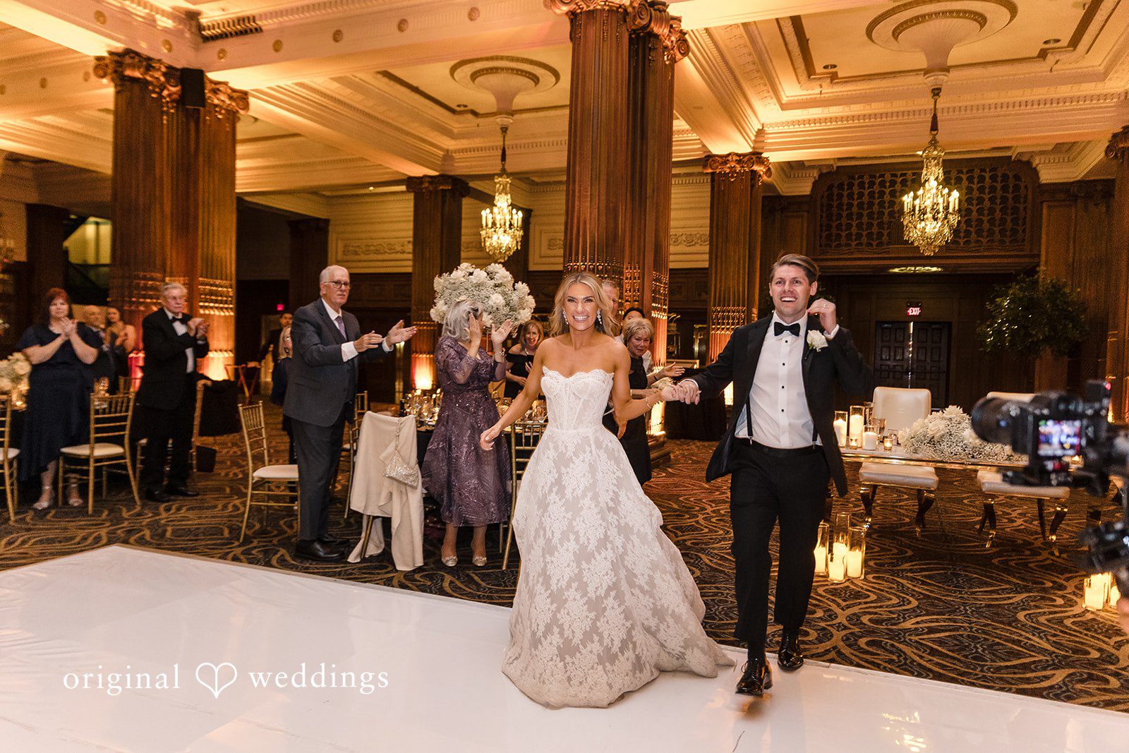 The couple makes a grand entrance at their wedding reception