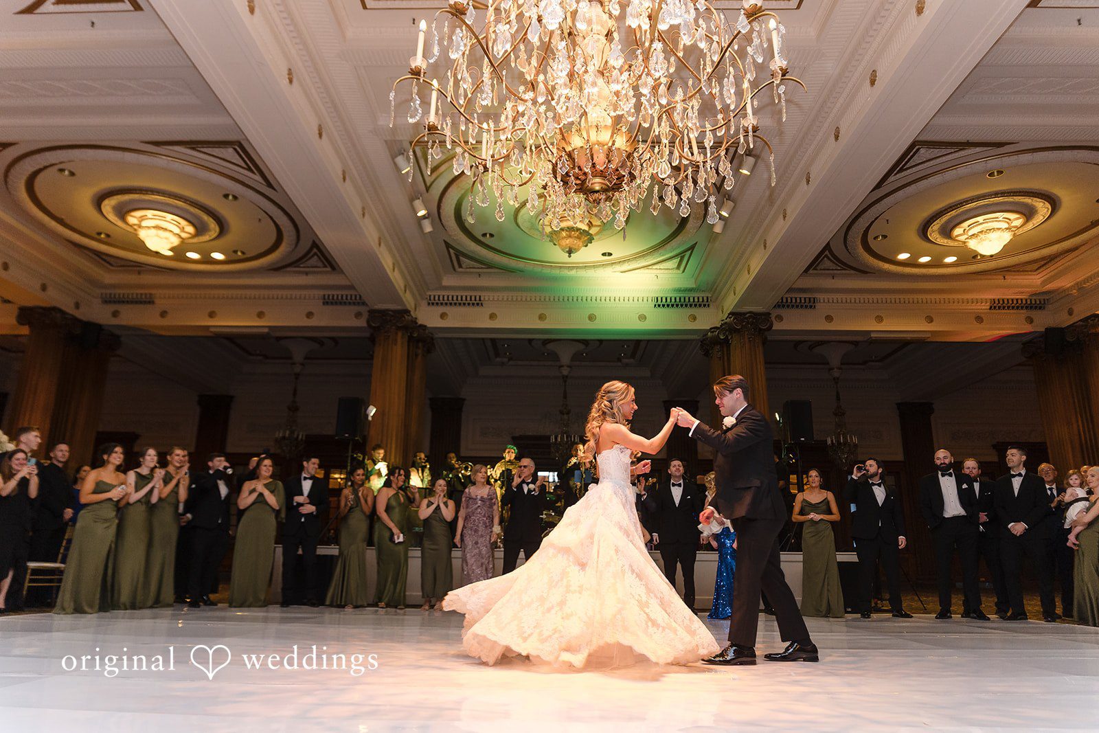 The couple takes their first dance
