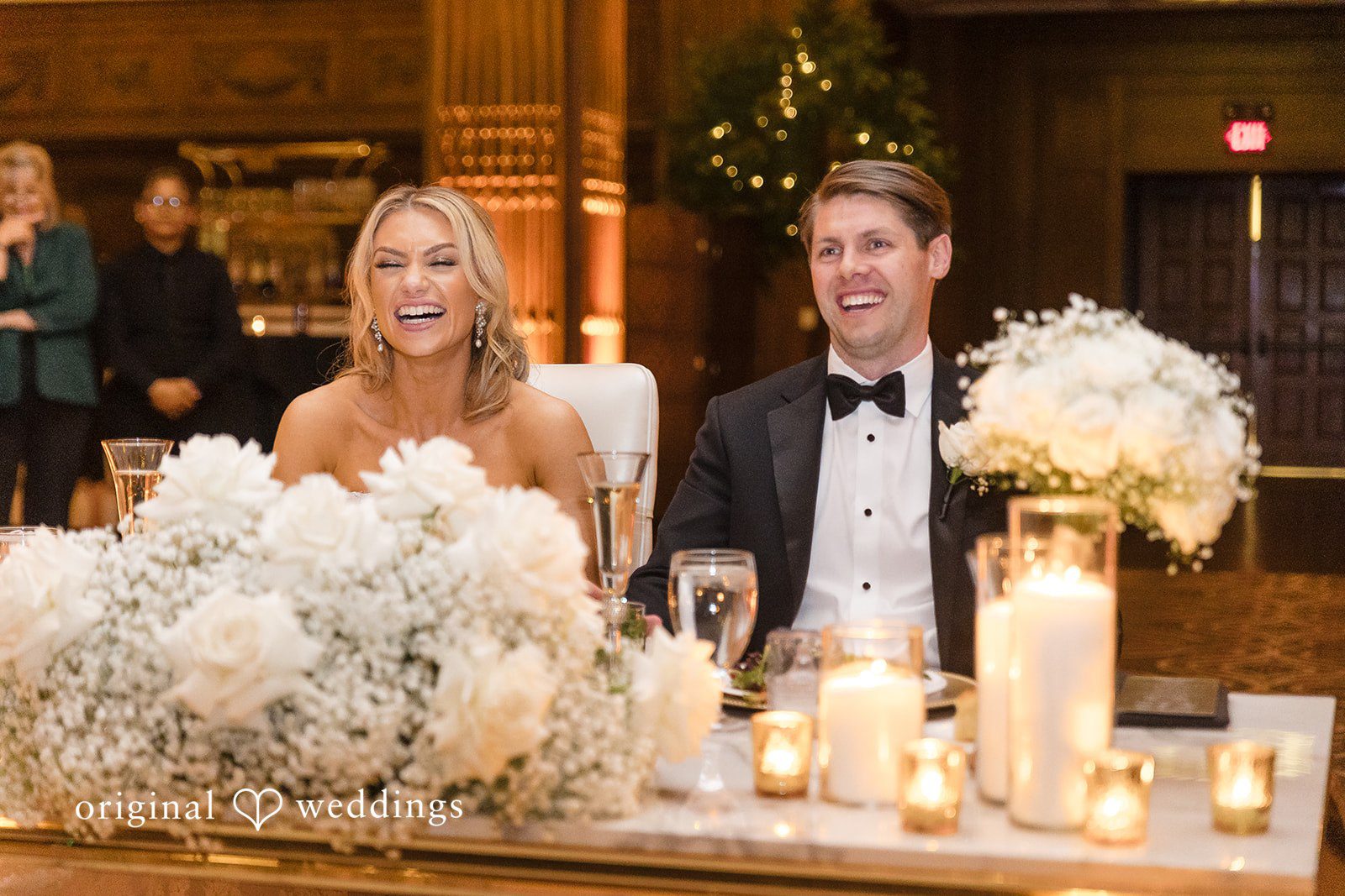 A happy couple at their wedding reception