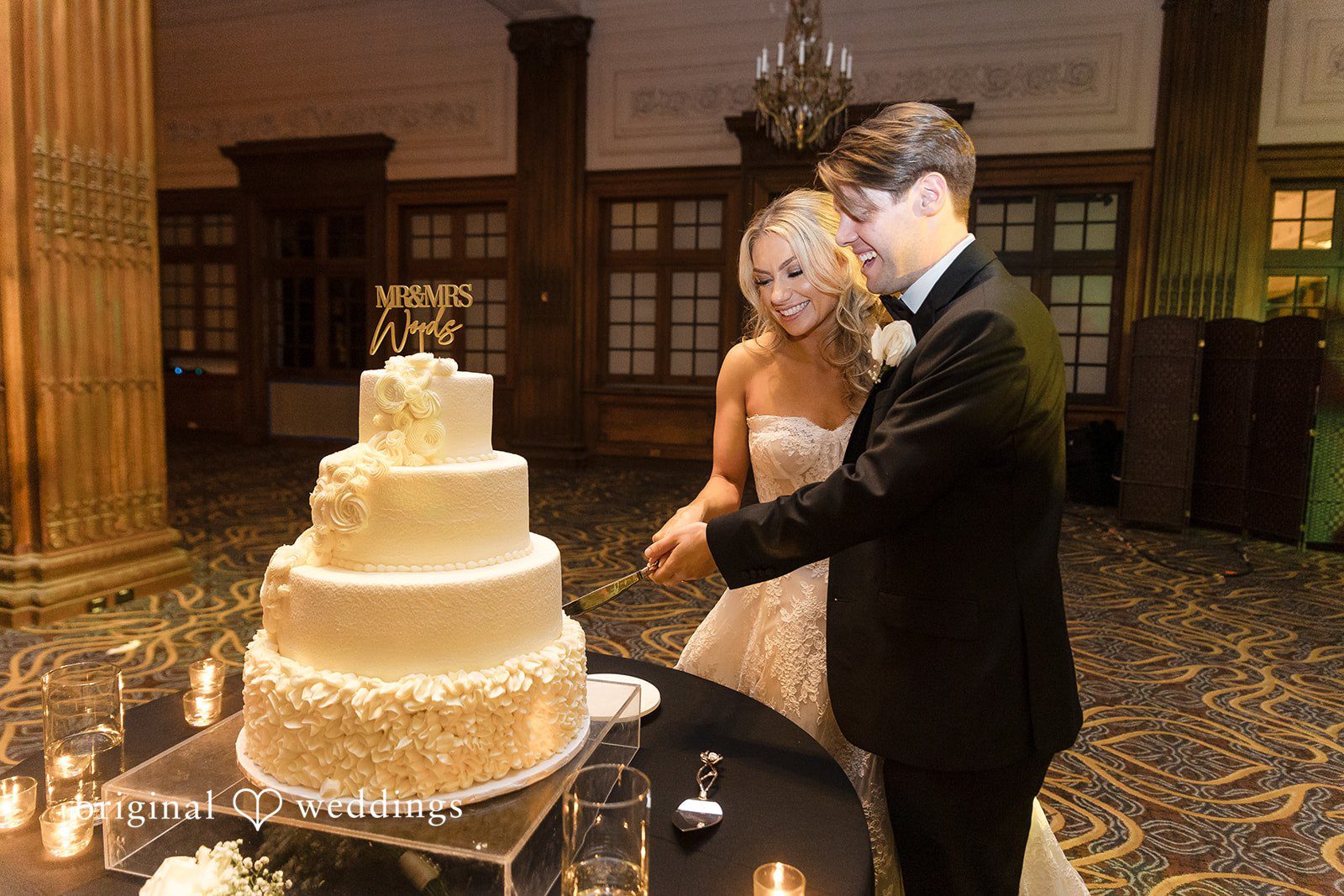 The couple cuts their cake