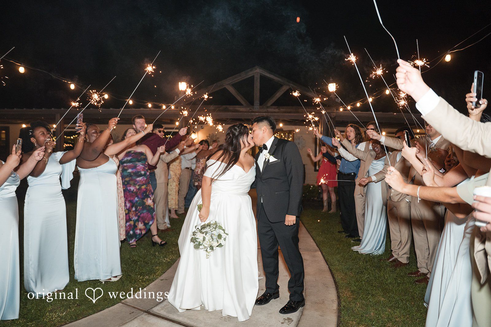 Cecilia + Jose Joyful wedding celebration kiss moment