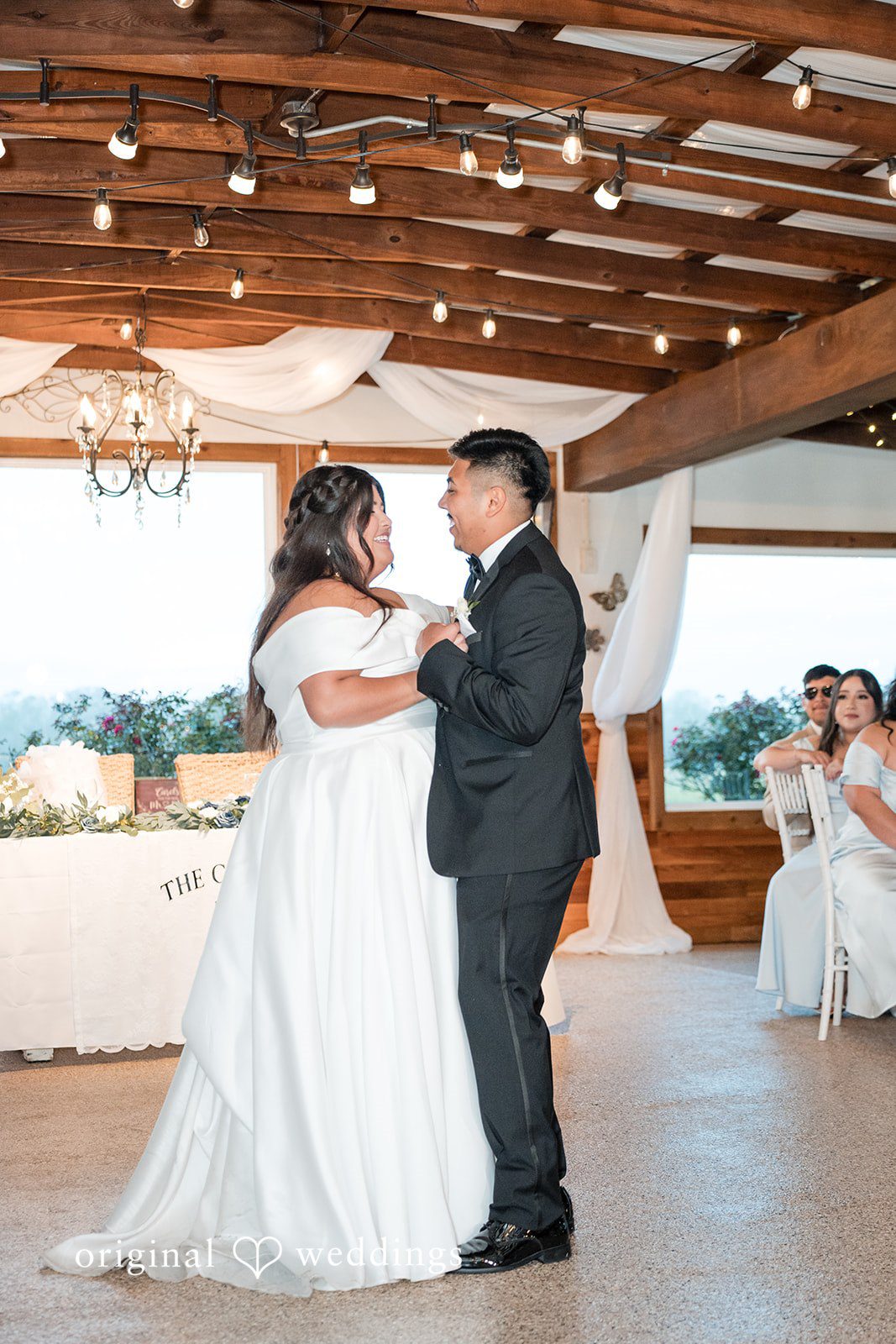 Cecilia + Jose Romantic slow dance between couple at reception