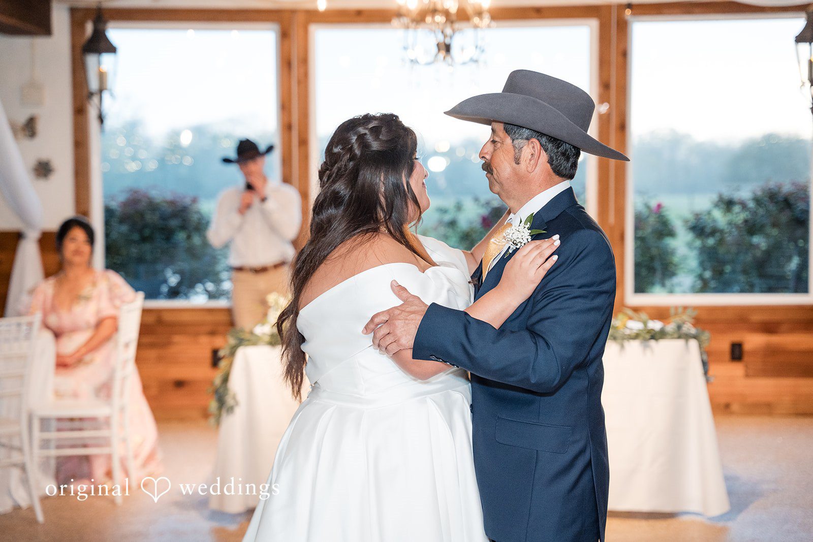 Cecilia + Jose Bride enjoying dance floor moment at wedding reception