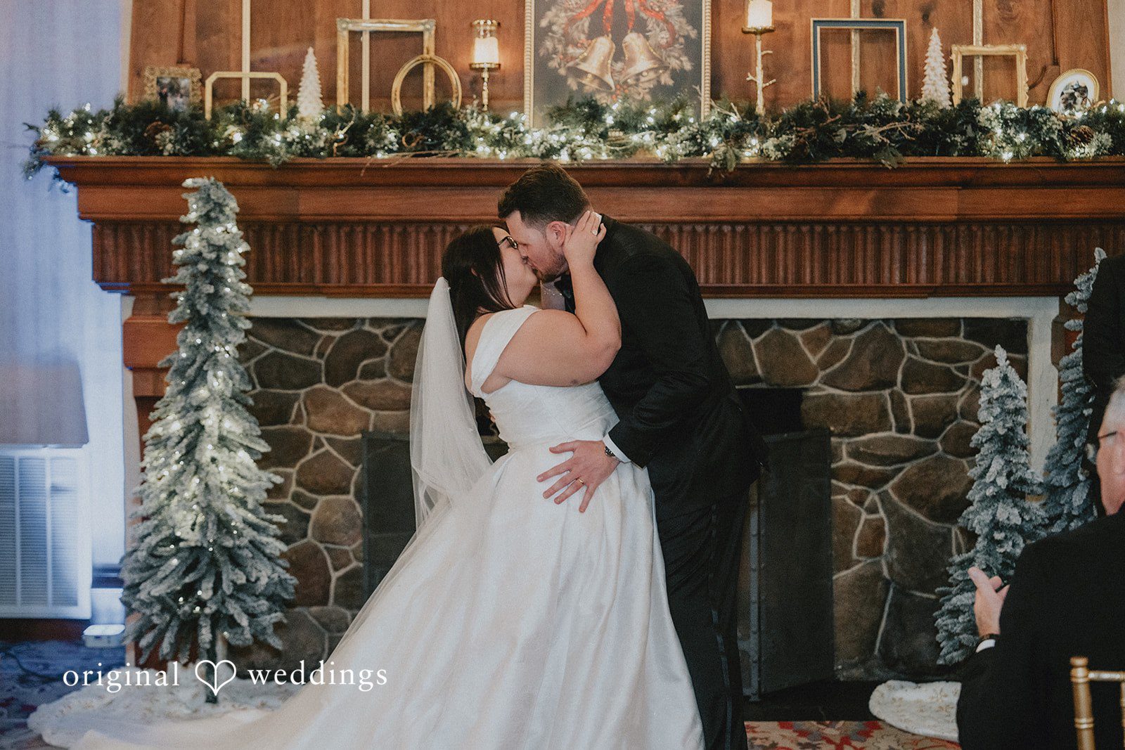 Couple sharing their first kiss after exchanging vows