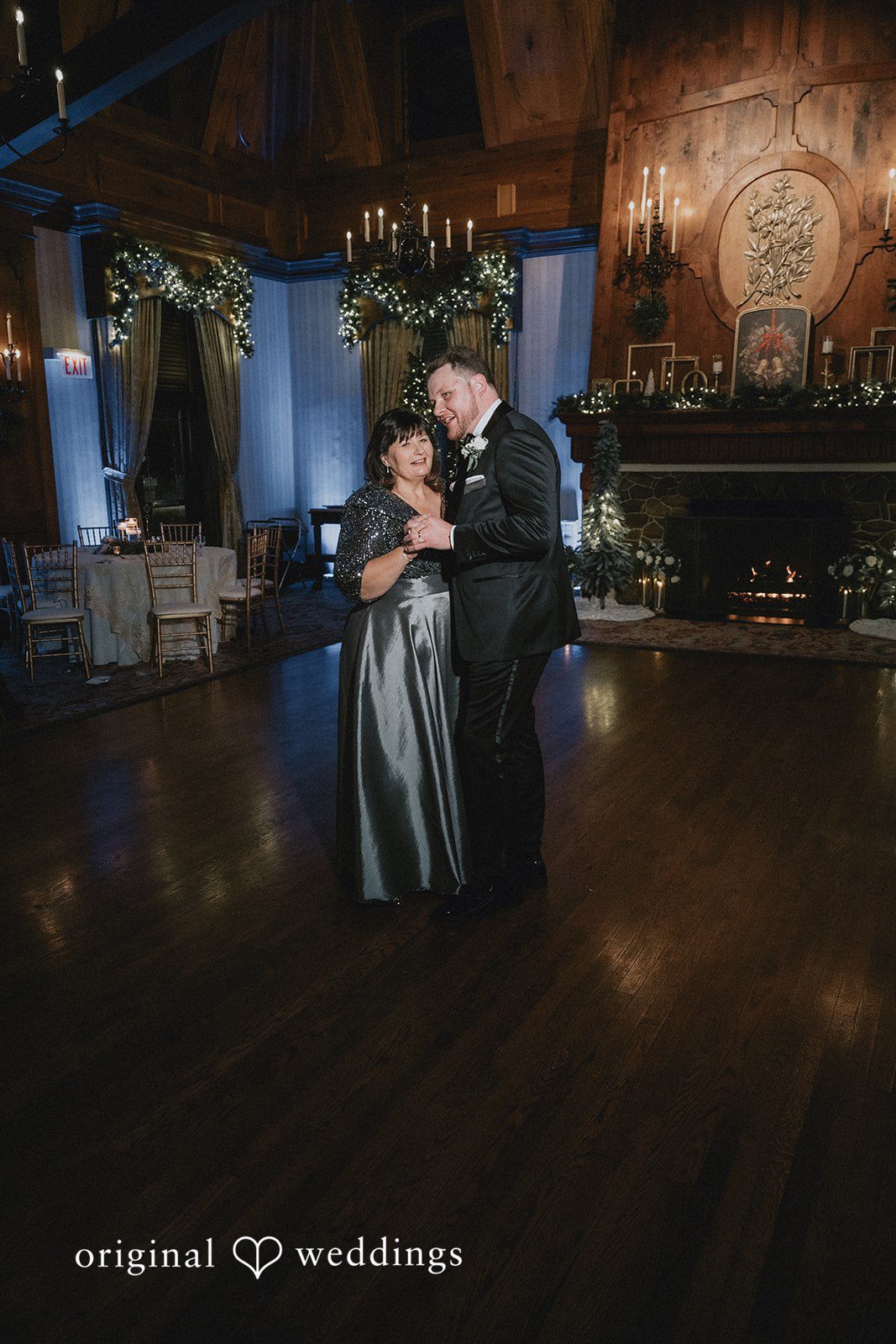 Groom dancing with his mother during the wedding celebration