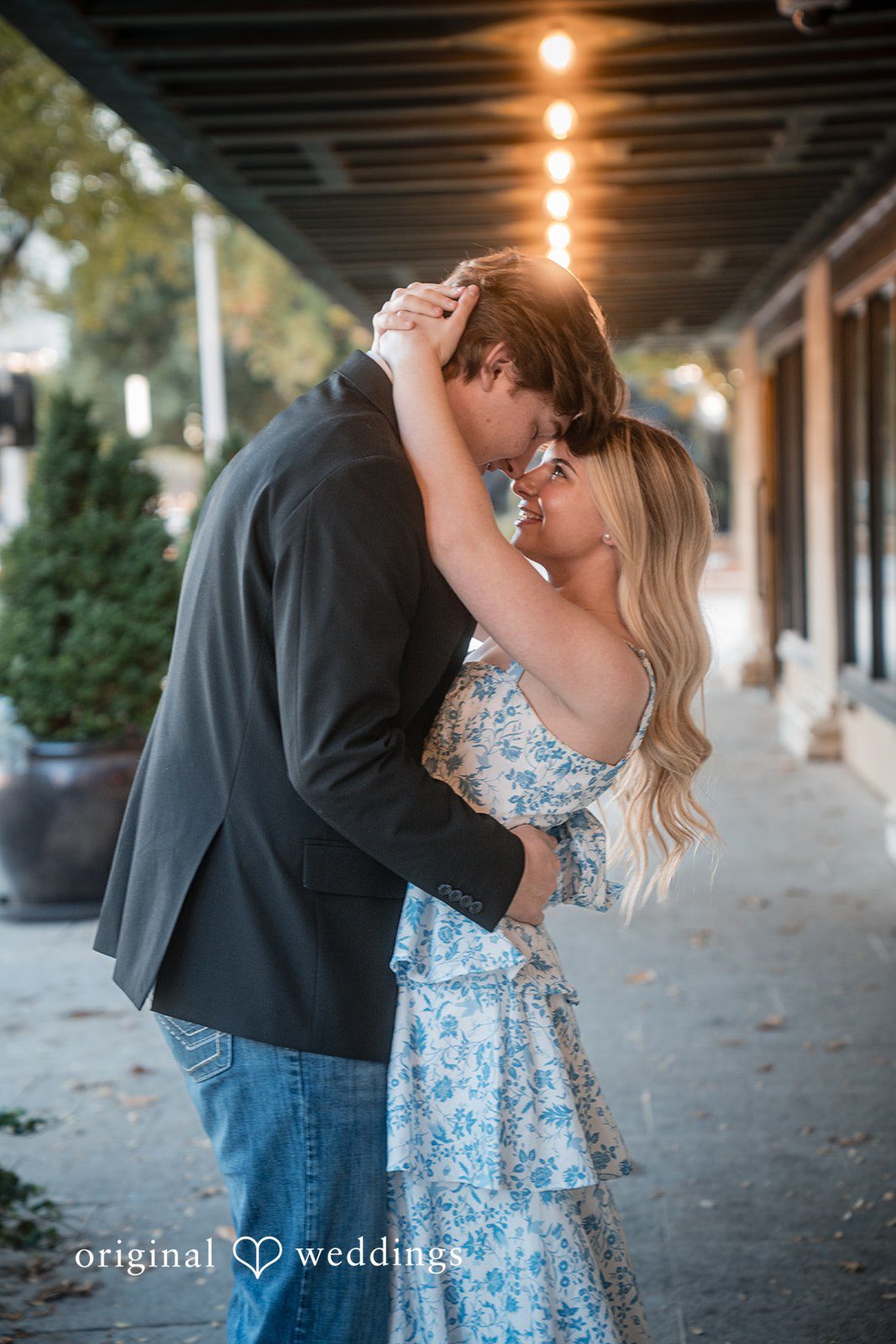 Romantic pose of couple joining their foreheads