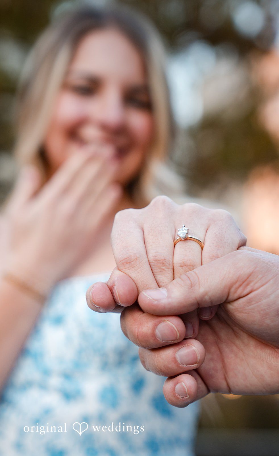 Detailed shot of engagement ring during engagement photography session at Colcord Hotel by Original Weddings
