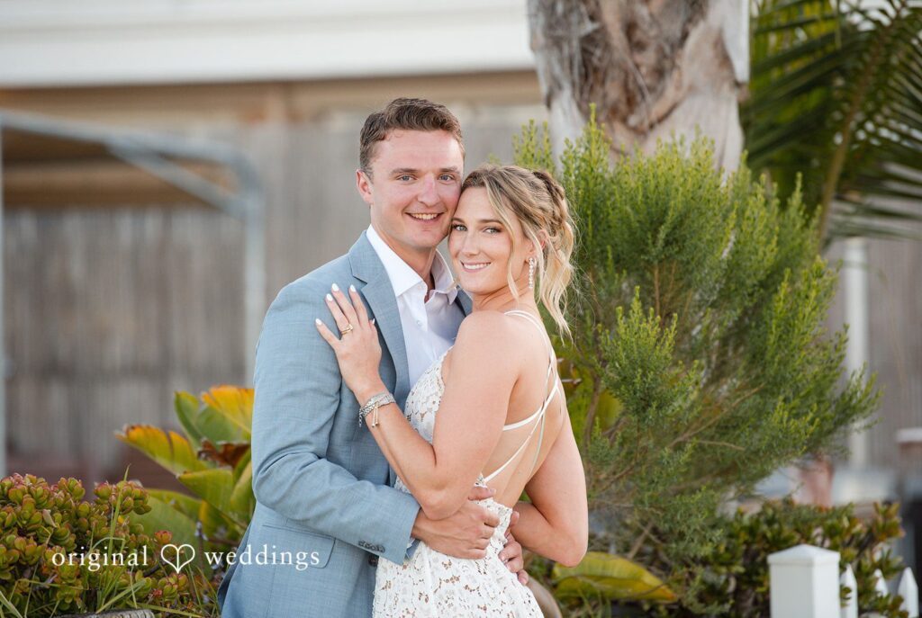 Romantic newlywed picture at Colorado Cays Yacht Club captured by San Diego Wedding photographers from Original Weddings
