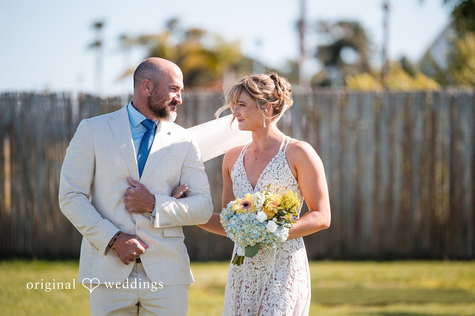 Bride walking down aisle at Colorado Cays Yacht Club