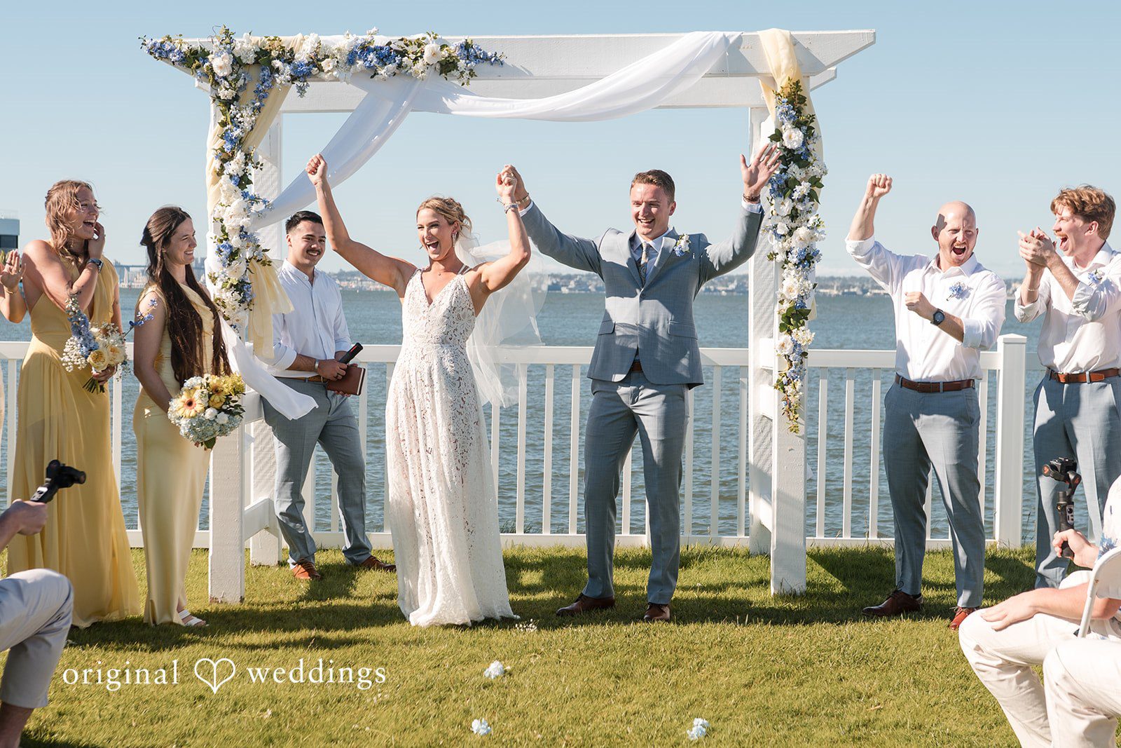 Newlyweds celebrating after ceremony at Colorado Cays Yacht Club