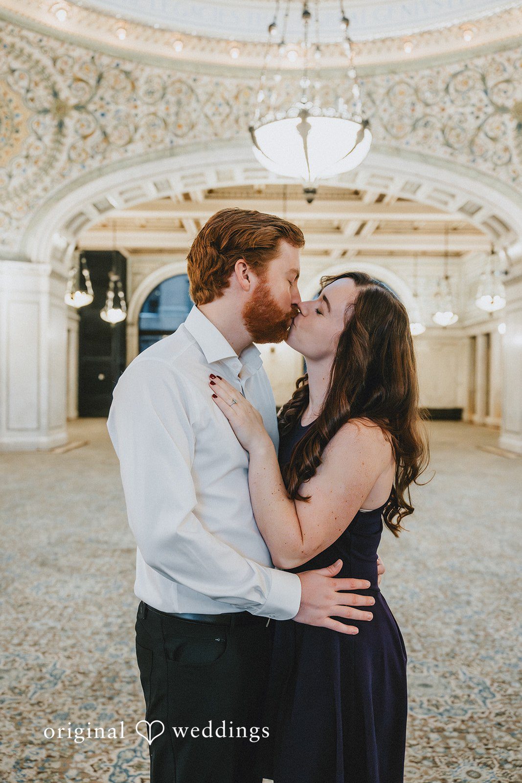Romantic kiss shot of couple at Cultural Center