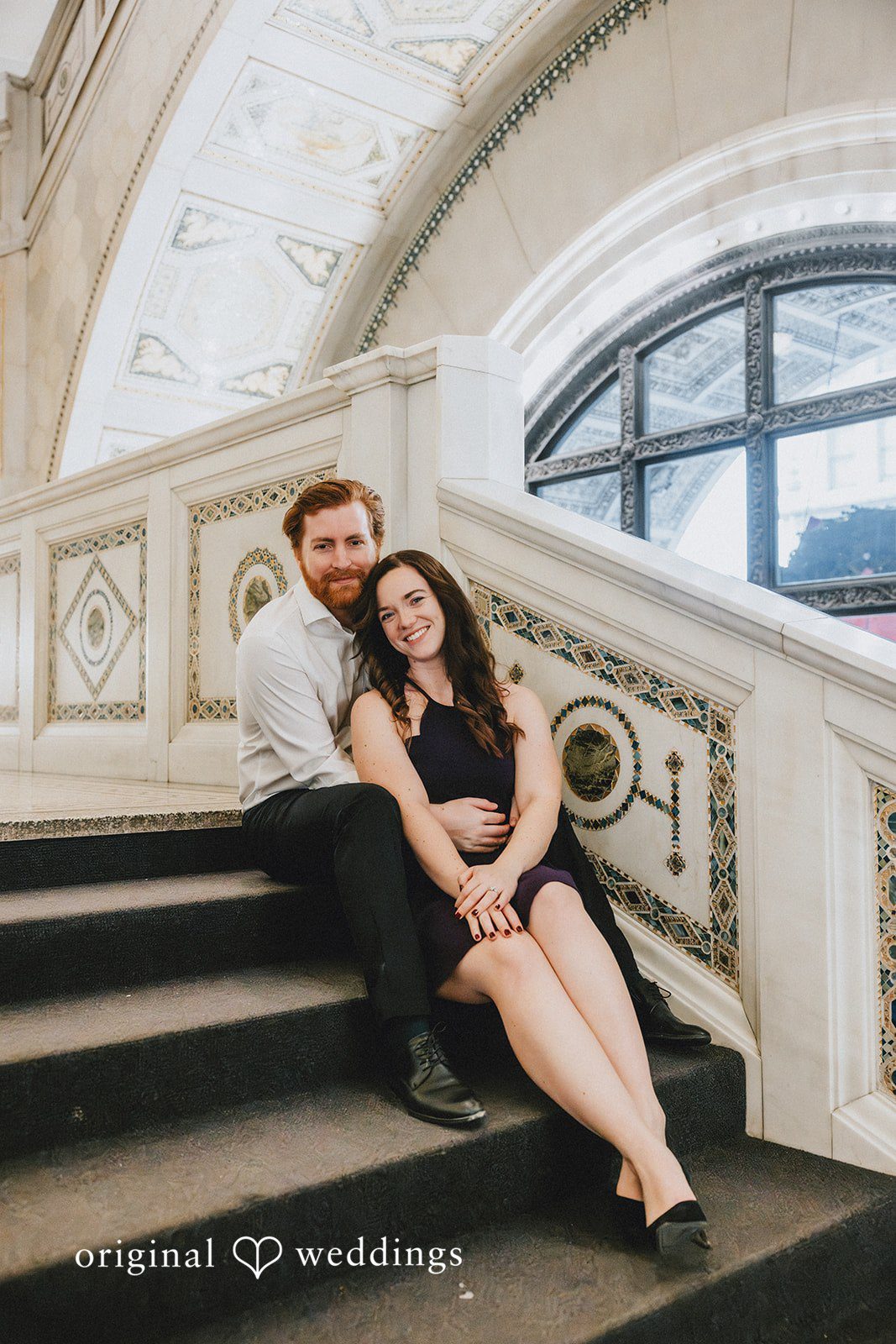 Lovely picture of couple seated in stairs of Cultural Center
