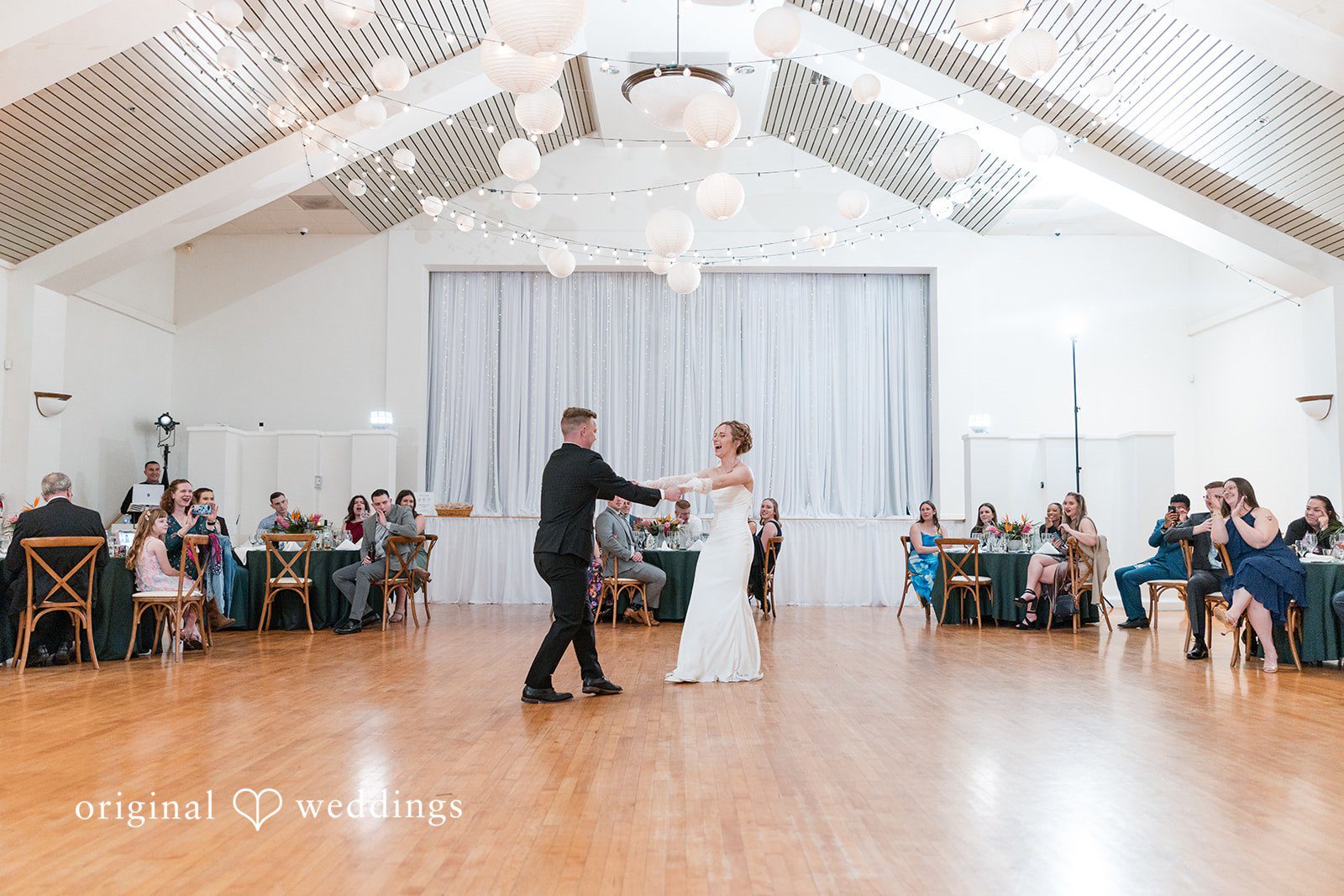 Bride and groom sharing their first dance.