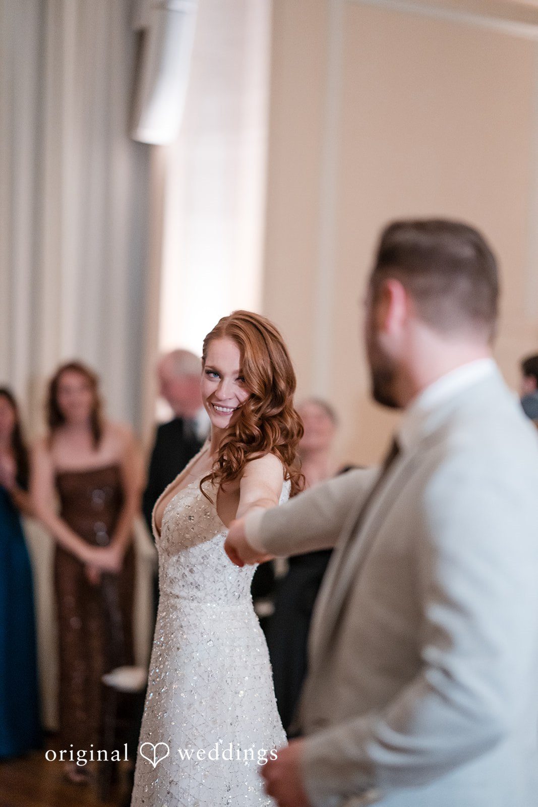 The couple takes their first dance