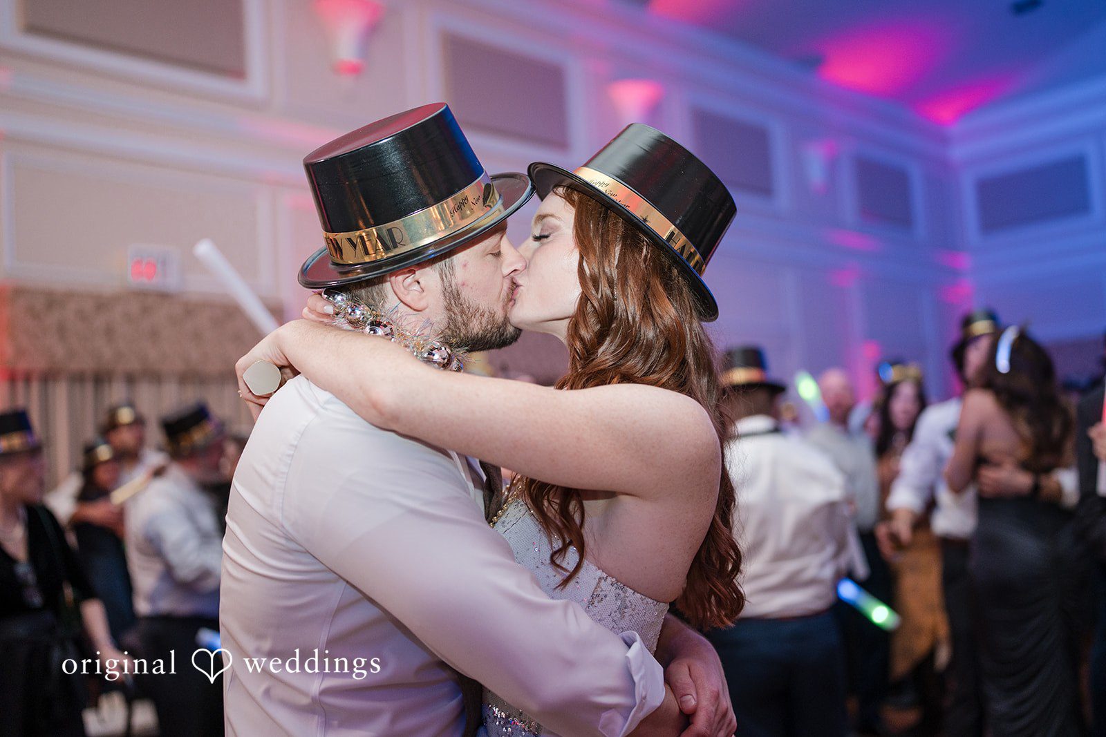 The couple shares a romantic kiss