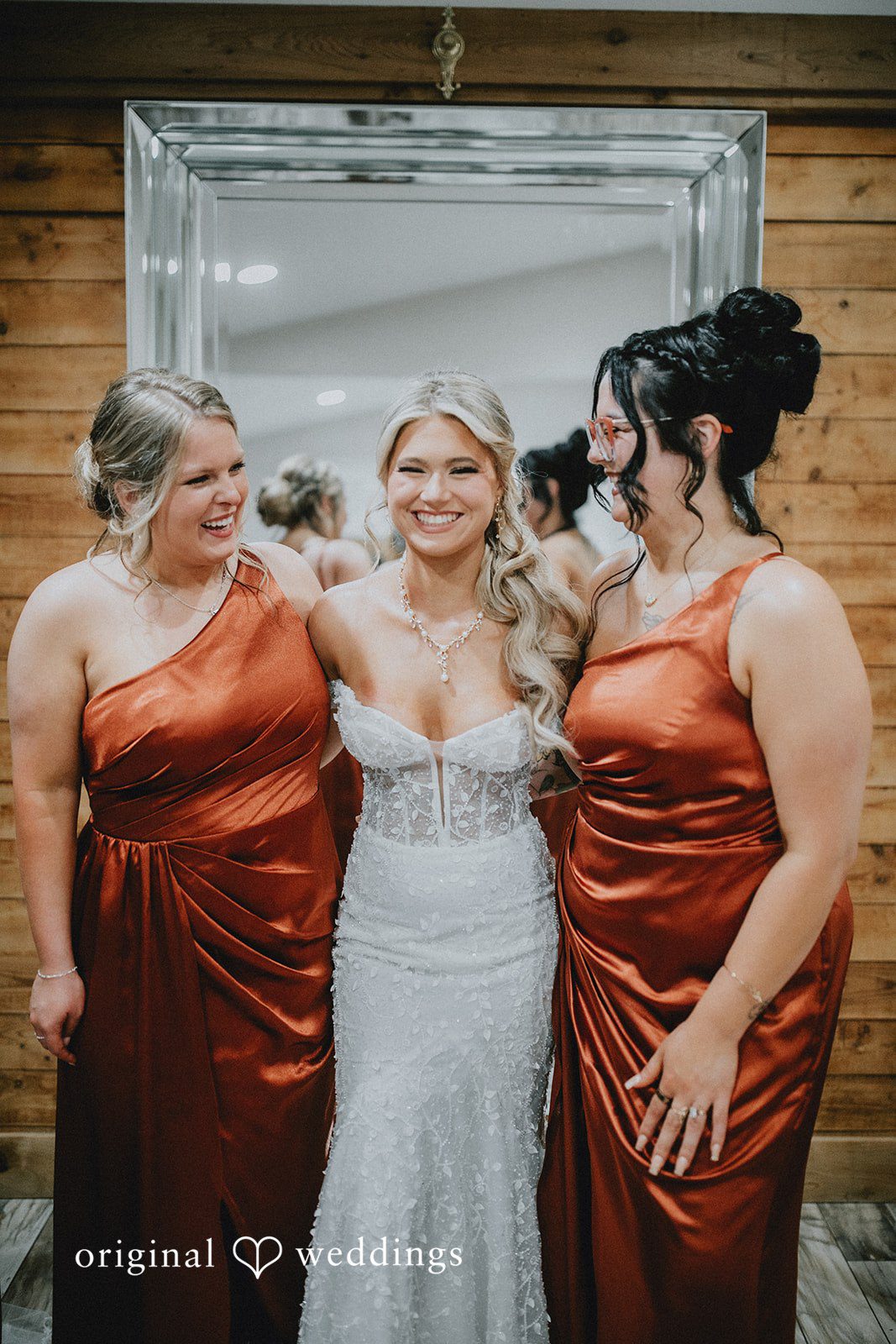 Catalyna + Nik Bridesmaids sharing a moment before the ceremony