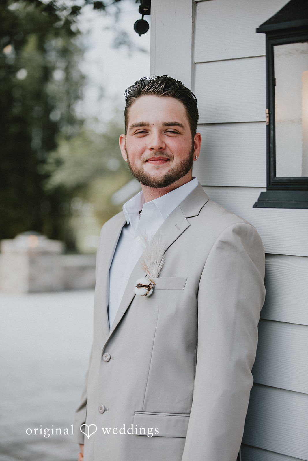 Catalyna + Nik Groom smiling during wedding portraits