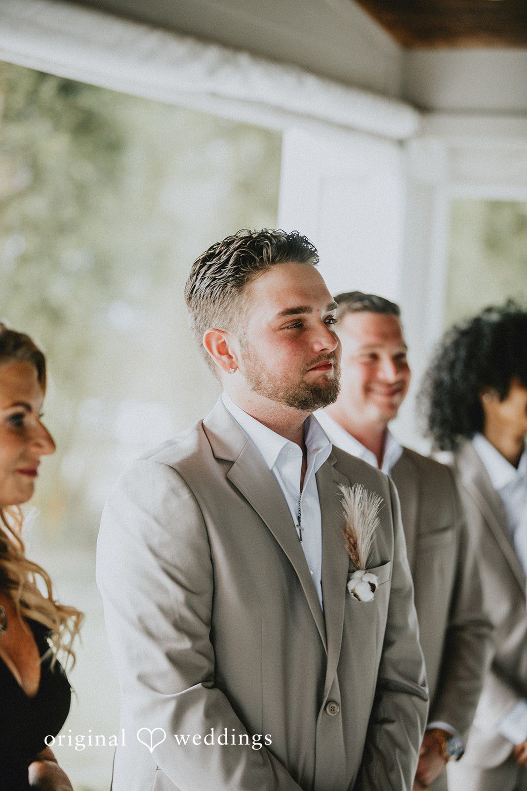 Catalyna + Nik Groom reacting during the ceremony