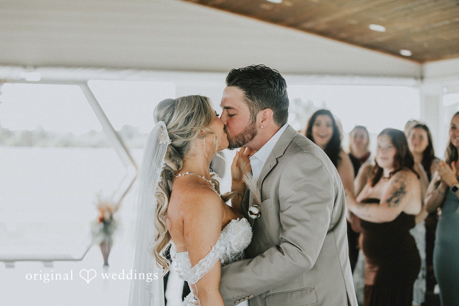 Catalyna + Nik Romantic ceremony kiss photographed by Orlando Wedding Photographers