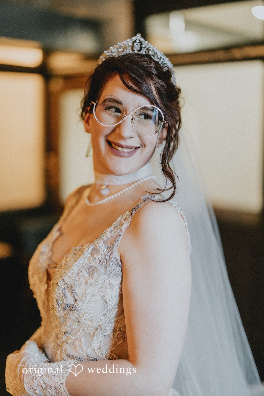 Stefani + Andrew Beautiful bride smiling in elegant wedding dress