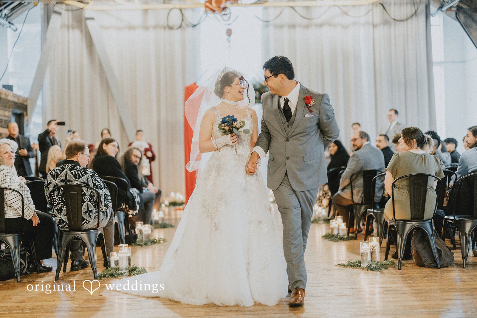 Stefani + Andrew Bride and groom walking together after wedding ceremony at Ederer Hall