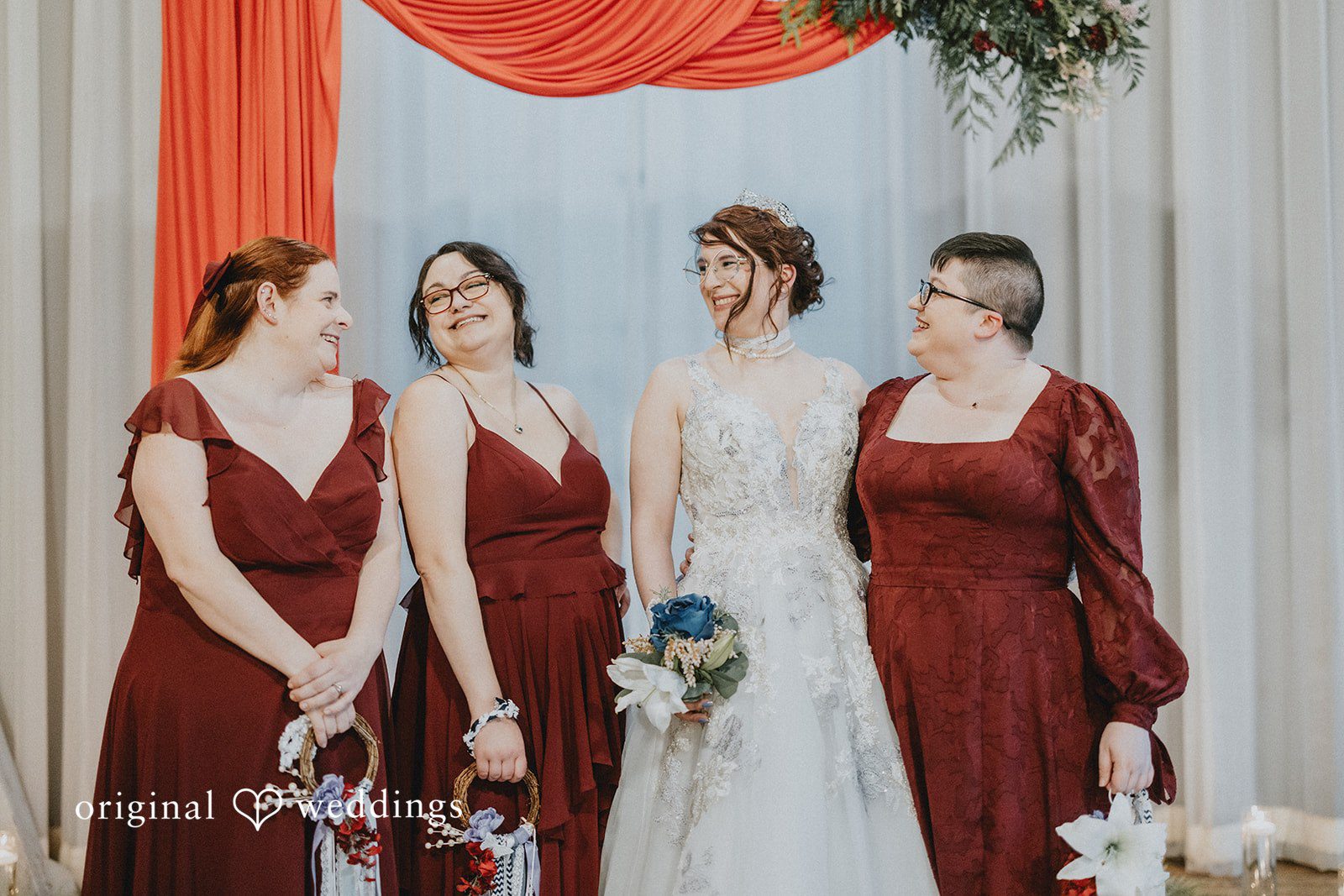 Stefani + Andrew Bride with bridesmaids sharing joyful wedding moment at Ederer Hall