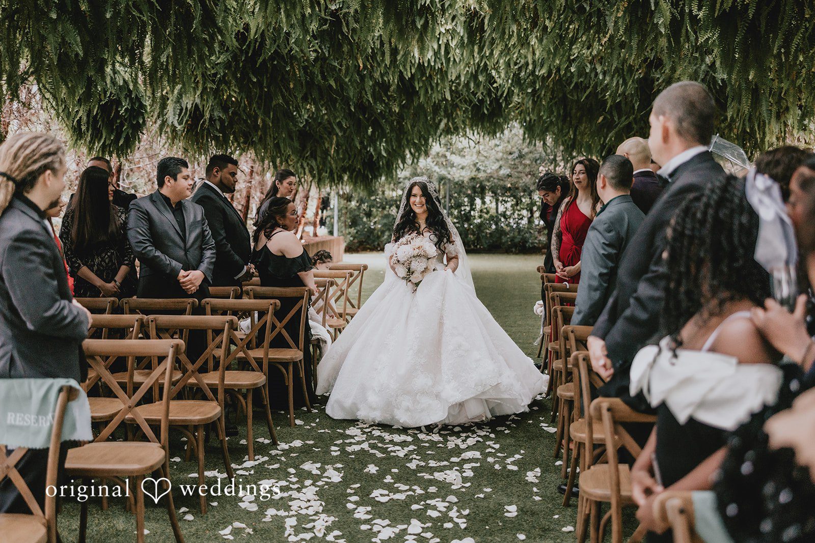 Lovely bride walking down the aisle