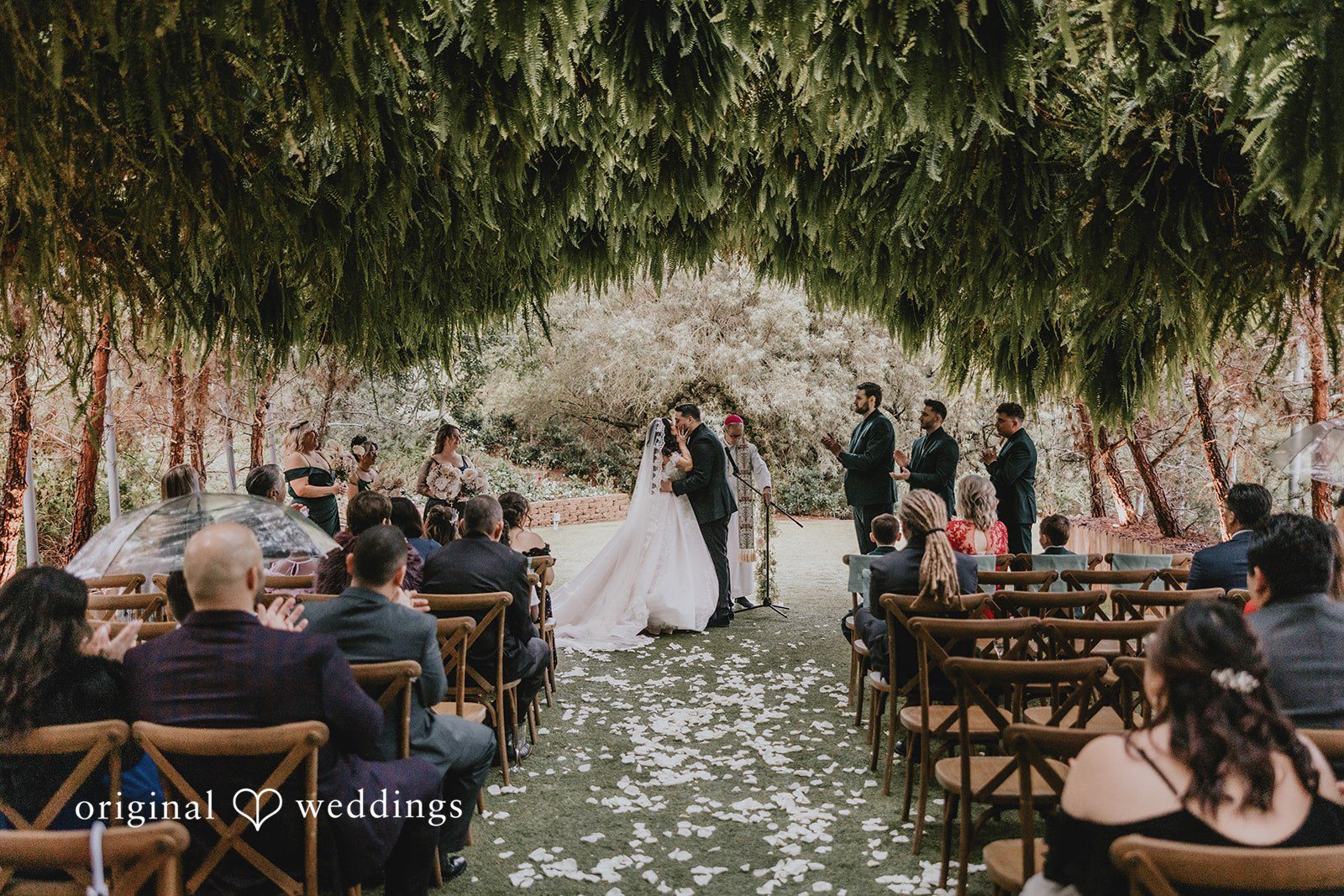 Romantic first kiss moment during ceremony