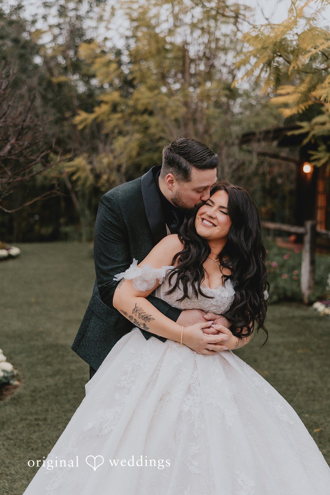 Lovely moment of groom kissing bride