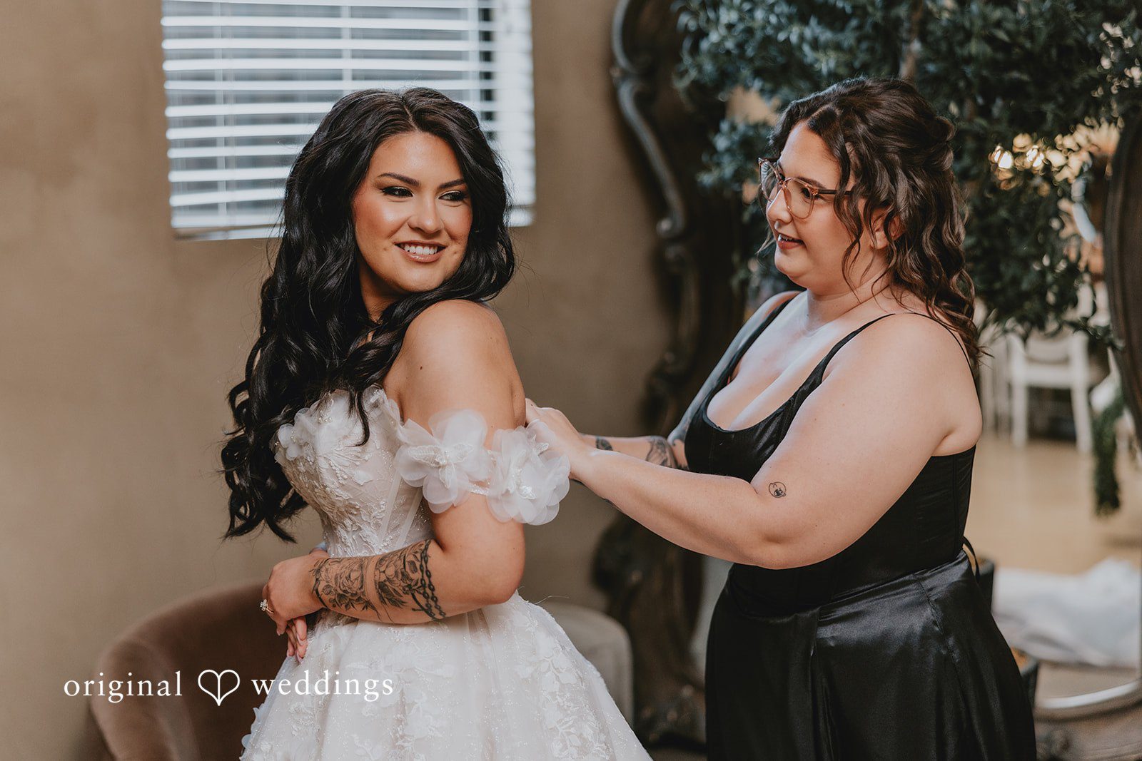 Bride getting ready happily at Ethereal Gardens