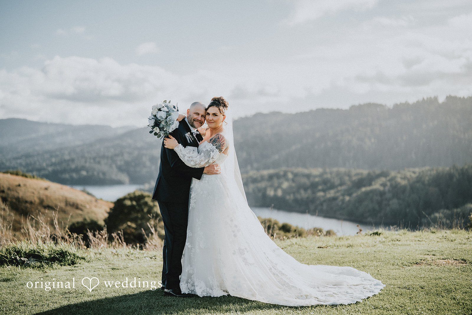 Dominique + Chris Couple embracing during romantic wedding portraits