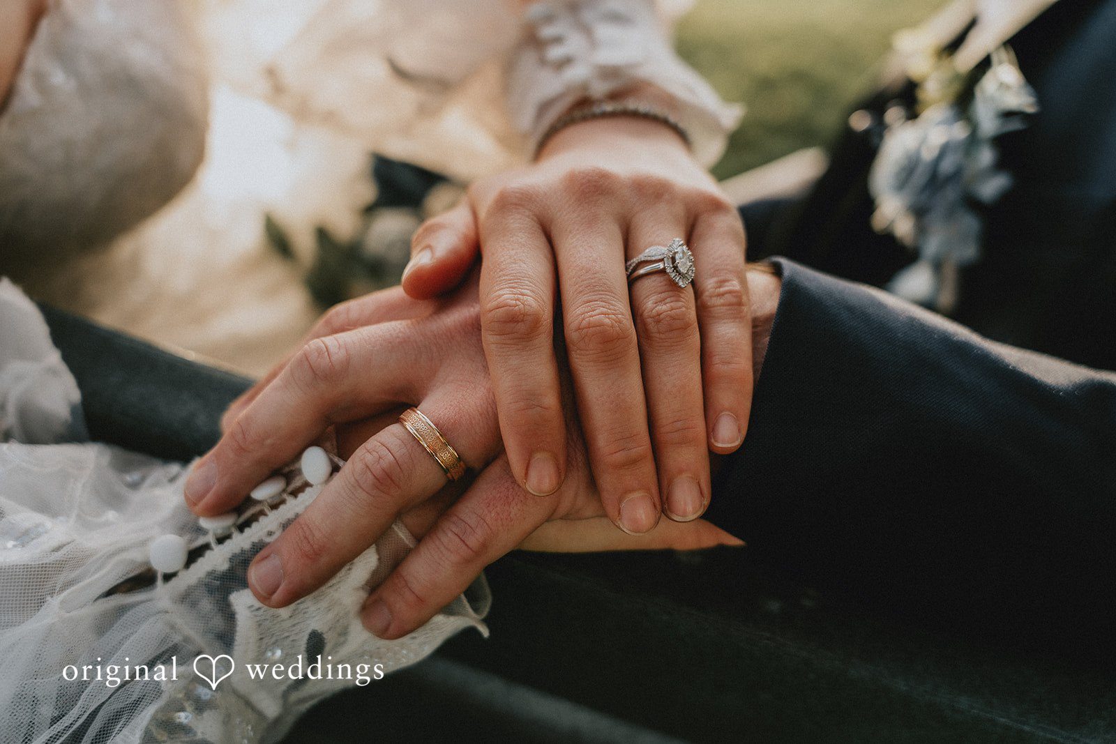 Dominique + Chris Bride and groom showing their wedding rings during portraits