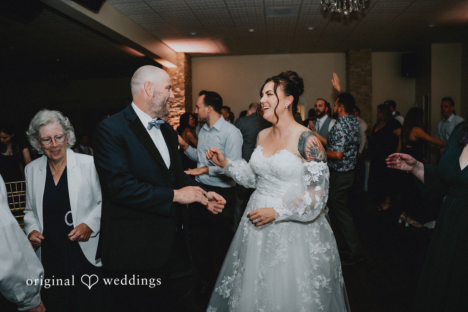 Dominique + Chris Bride and groom enjoying happy moments at the reception