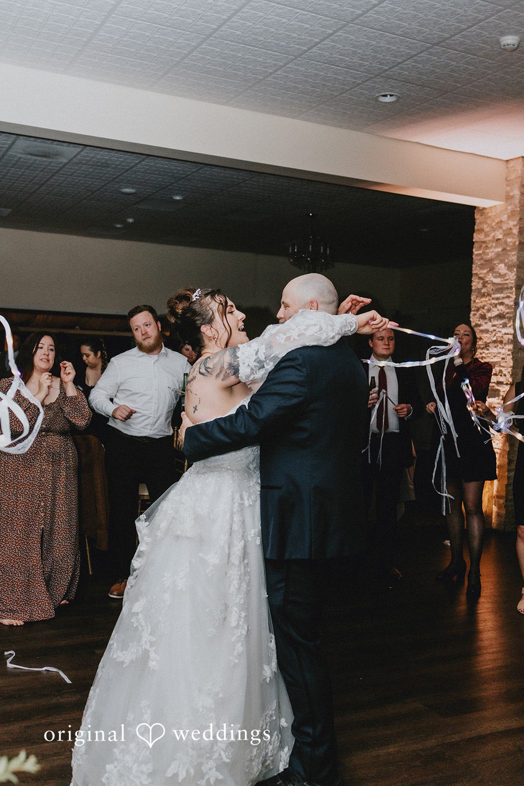 Dominique + Chris Bride and groom dancing together during the reception celebration
